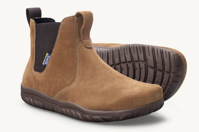 Unisex Lems Chelsea boots with tan leather uppers, side elastic panels, and a sturdy sole, shown from a three-quarter angle.