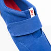 Splay Explore 2.0 shoes in cobalt blue and white, featuring a sleek athletic design with breathable fabric and modern outsole.