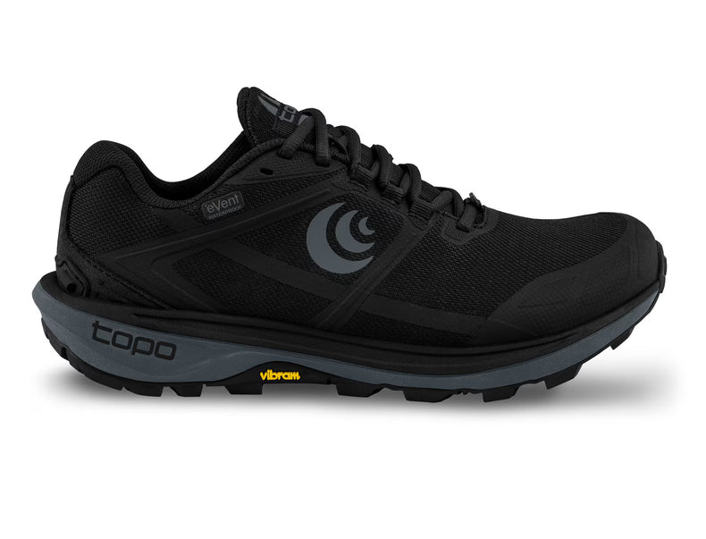 Topo Athletic Terraventure 4 Waterproof men's shoes in black and charcoal, featuring a rugged outdoor design and durable waterproof material.