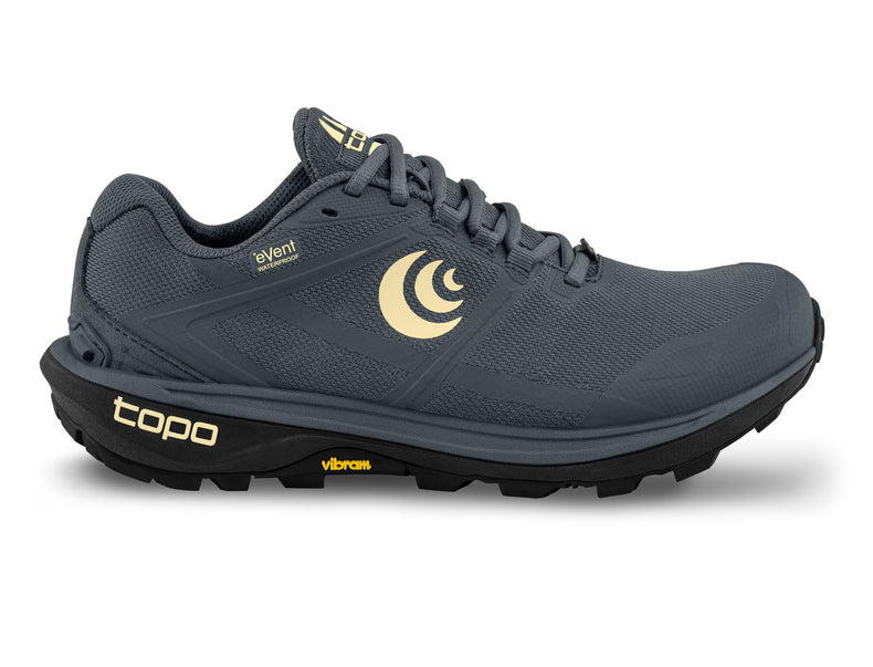 Women's Terraventure 4 waterproof shoes by Topo Athletic in grey and butter color, designed for outdoor activities and trail running.