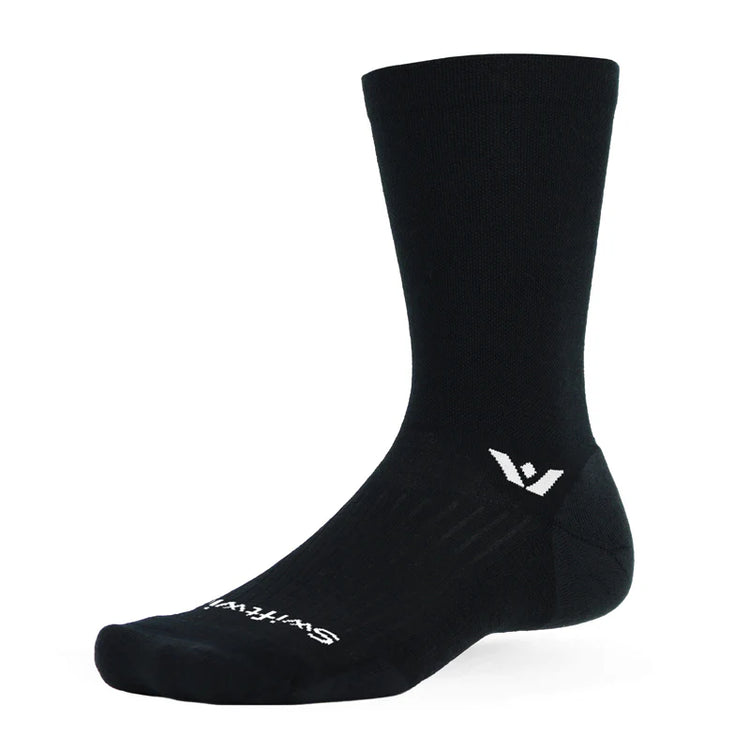 Black Swiftwick Pursuit crew socks with logo design, featured in a profile view on a white background.
