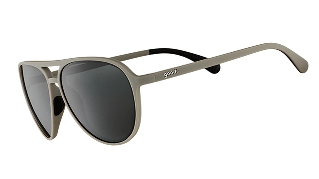 Goodr Clubhouse Closeout sunglasses with transparent side lenses and sporty black frame, stylish and UV protected.