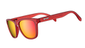 GOODR Phoenix sunglasses with transparent frame and colorful lens, shown at a Bloody Mary bar setting.