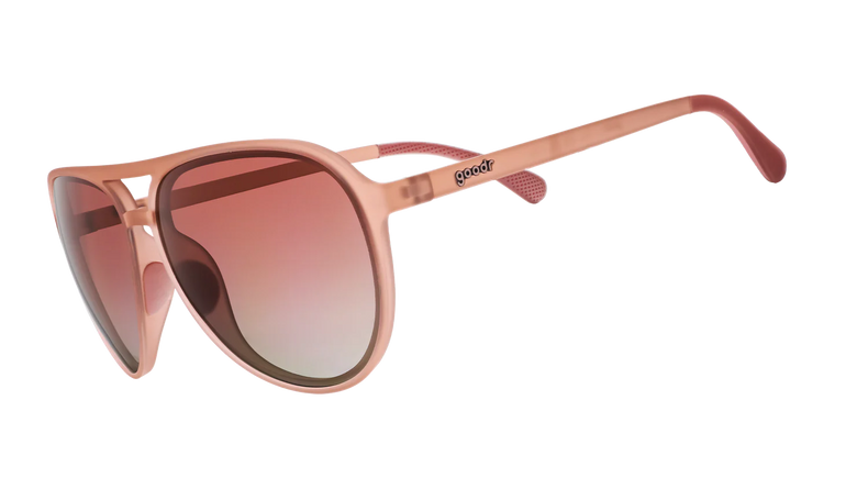 Goodr Purple's Midlife Crisis sunglasses with side transparent design, sporty frame, and vibrant purple color.