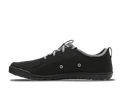 Astral Footwear Loyak men's shoes in space black, showing side view with inside detail and shadowed background.