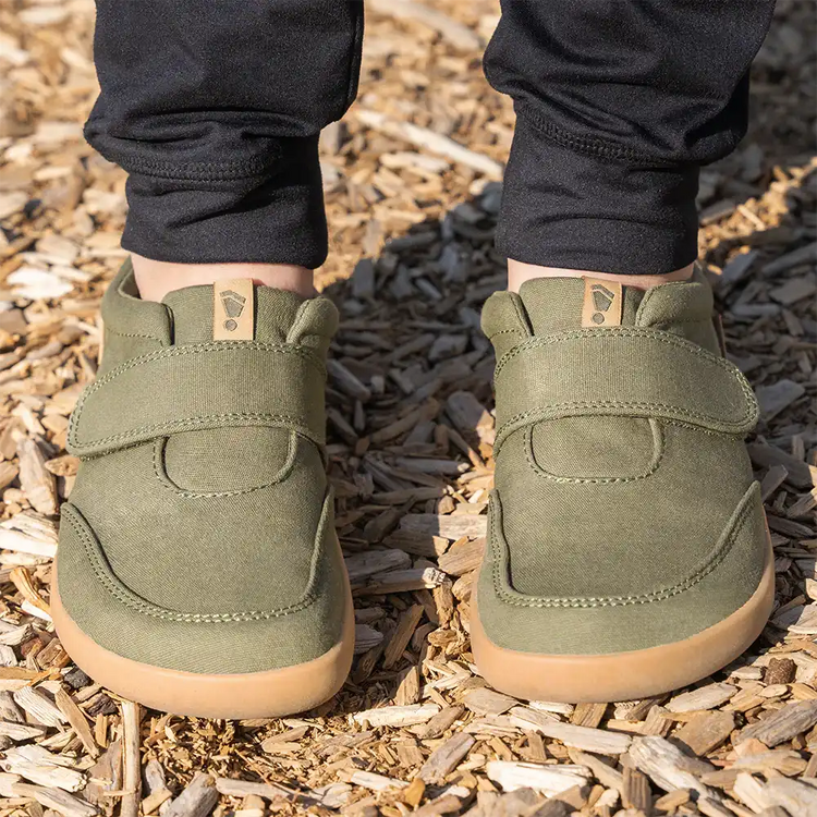 Splay Explore 2.0 shoes in pine green with black accents, featuring a sleek athletic design and breathable fabric upper.