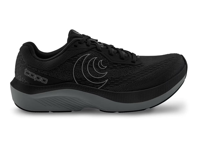 Men's Magnifly 6 running shoes by Topo Athletic in black and charcoal with breathable mesh upper and cushioned sole.