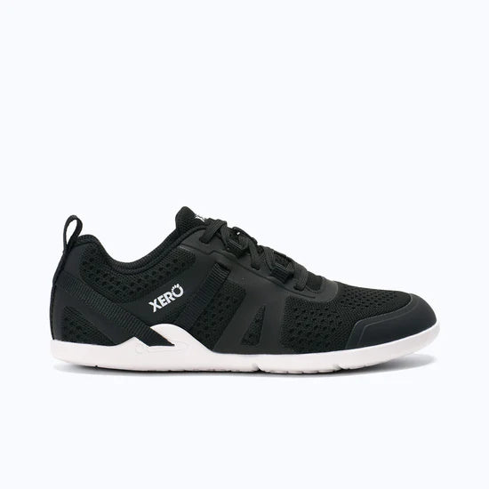 Xero Shoes Prio Neo women’s black and white athletic shoes, right side view showing sleek design and lightweight construction.