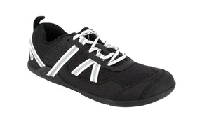 Xero Shoes Prio youth shoes in white and black, featuring a comfortable design and athletic style for kids.