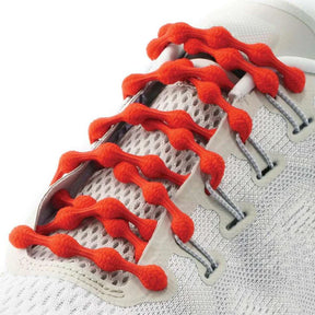Ruby red CATERPY no tie shoelaces for easy slip-on footwear, featuring a sleek, vibrant design with a smooth, elastic finish.
