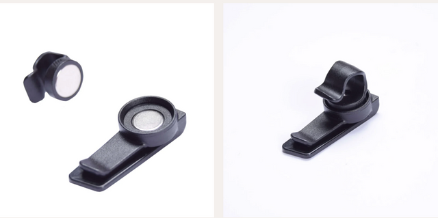 USWE Magnetic Tube Clip holding a flexible tube securely, designed for bike or outdoor gear organization.