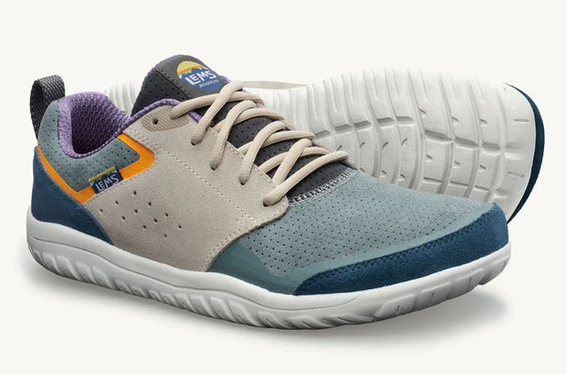 Lems Primal Zen suede unisex shoes with a low-profile design and neutral color, shown from a 3/4 side angle.