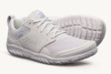 Pair of white Lems Primal Zen unisex shoes showing the side view and breathable mesh upper.
