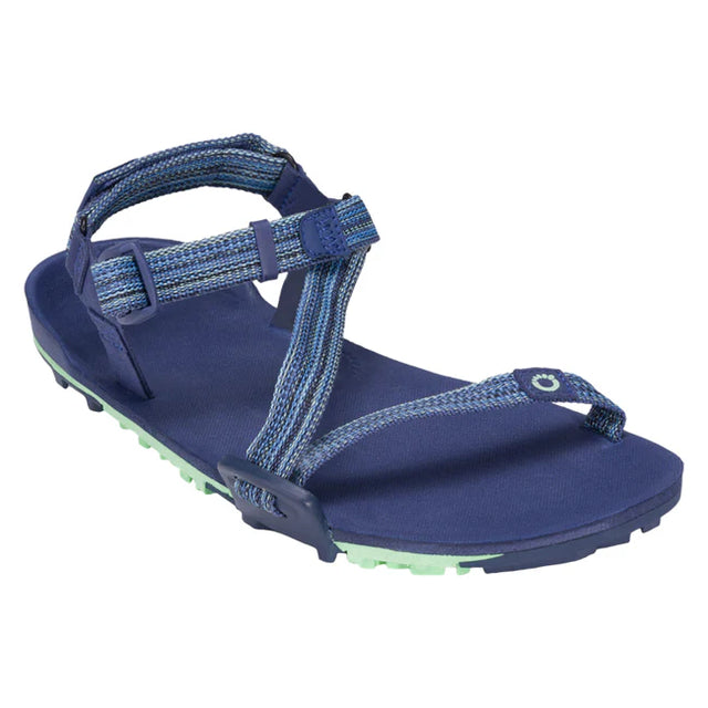 Xero Shoes Z-Trail EV women's trail running shoes in blue indigo with diagonal design, lightweight and breathable.