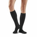 Black CEP Allday Tall Compression Socks for women, shown in a close-up image of the knee-high length and snug fit.
