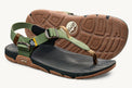 Lems Switchback Sandal shoes with tan straps and cactus green sole, shown from a 3/4 angle.